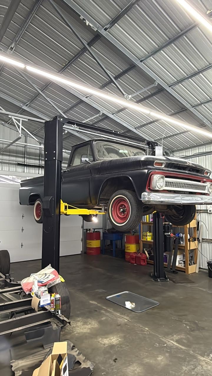 Vehicle on shop hydraulic lift